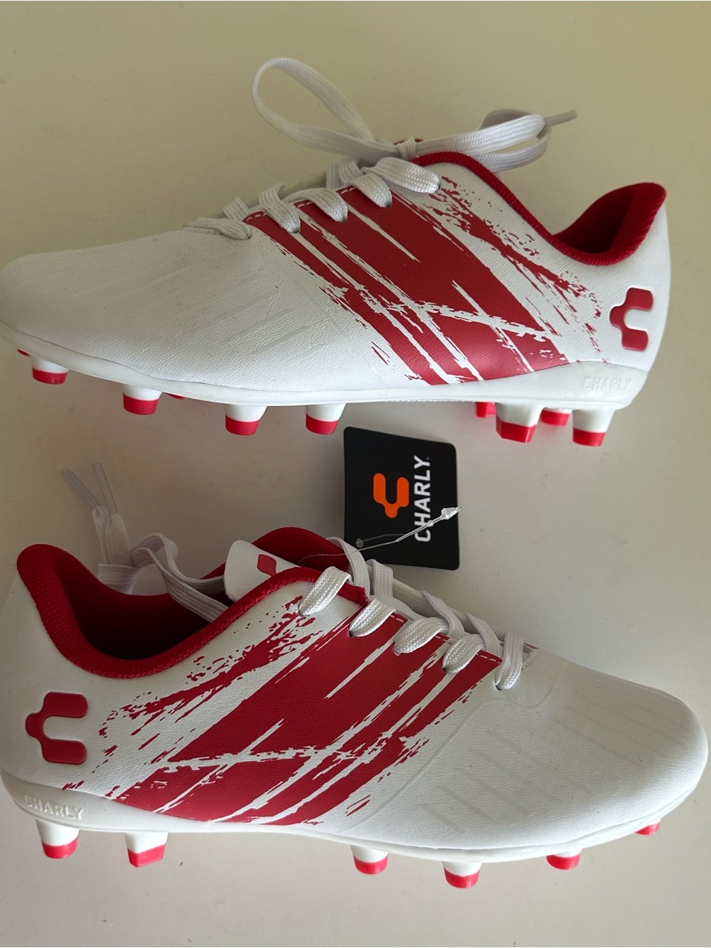 Charly Grasshopper Youth firm ground cleats Size:2.5